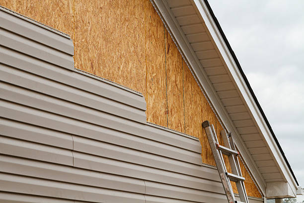 Professional Emergency Siding Repair technician working in Broomes Island, MD